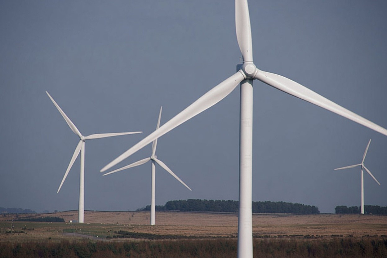 Wind turbines across open countryside